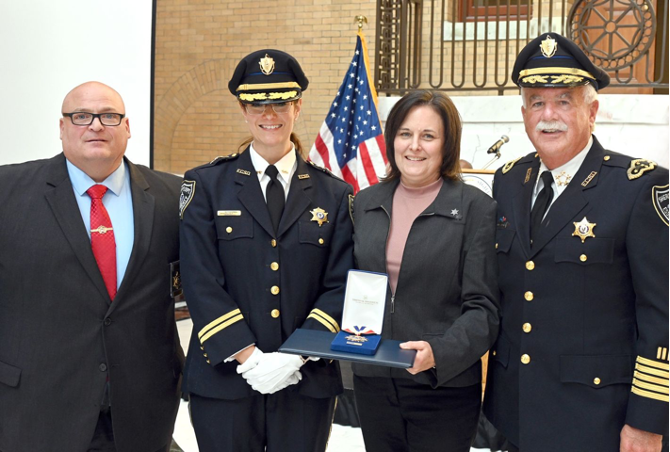 Hampden Sheriff Nick Cocchi poses with Essex Sheriff Kevin Coppinger and his staff after receiving the program of the year award at the MSA Awards Ceremony.