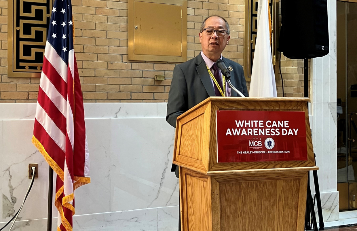 MBTA General Manager Phillip Eng speaks from behind the podium