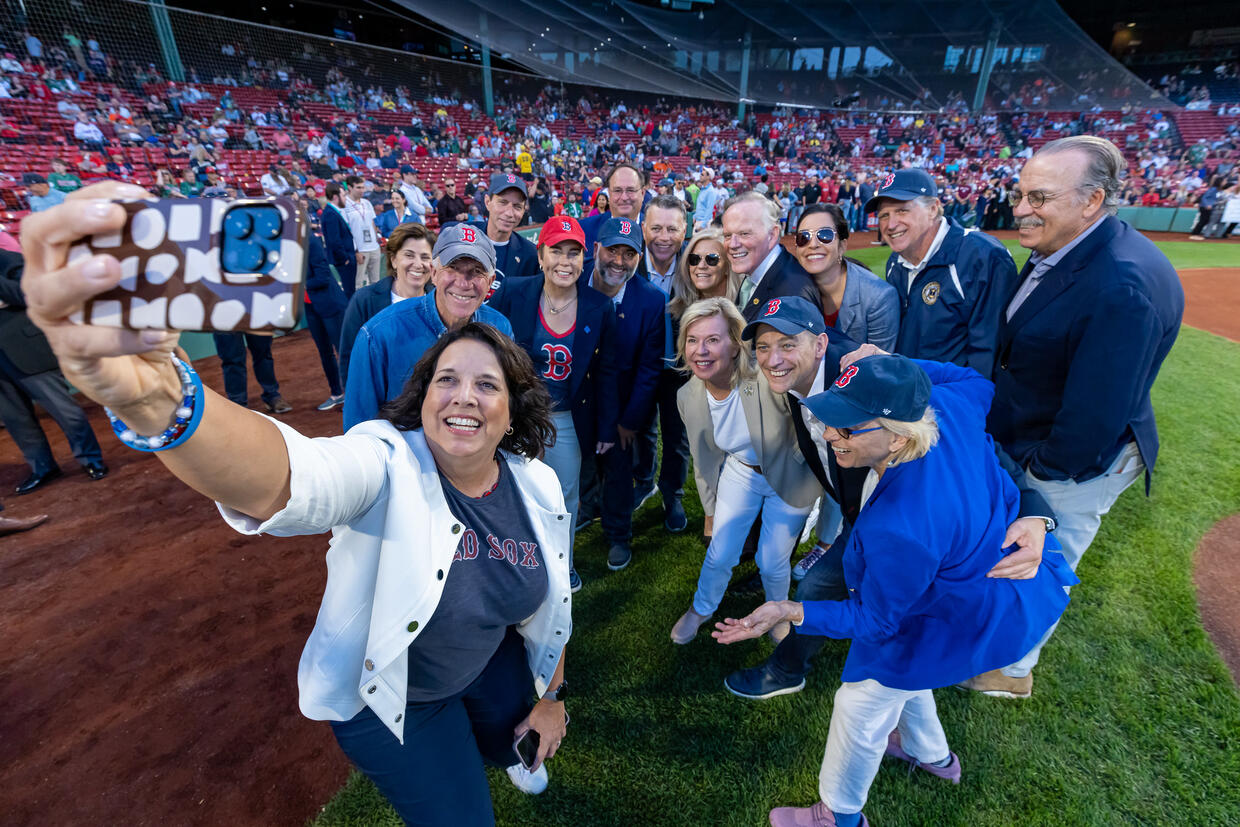 LG Driscoll taking selfie with NEG-ECP conference participants at Fenway Park.