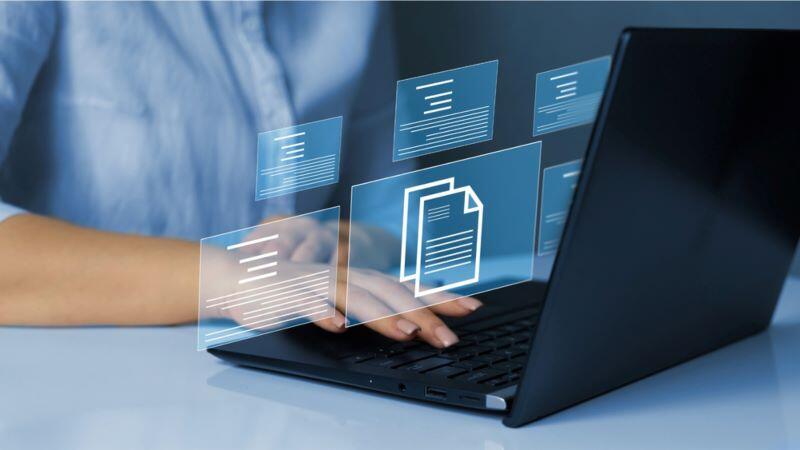 A person using a laptop computer
