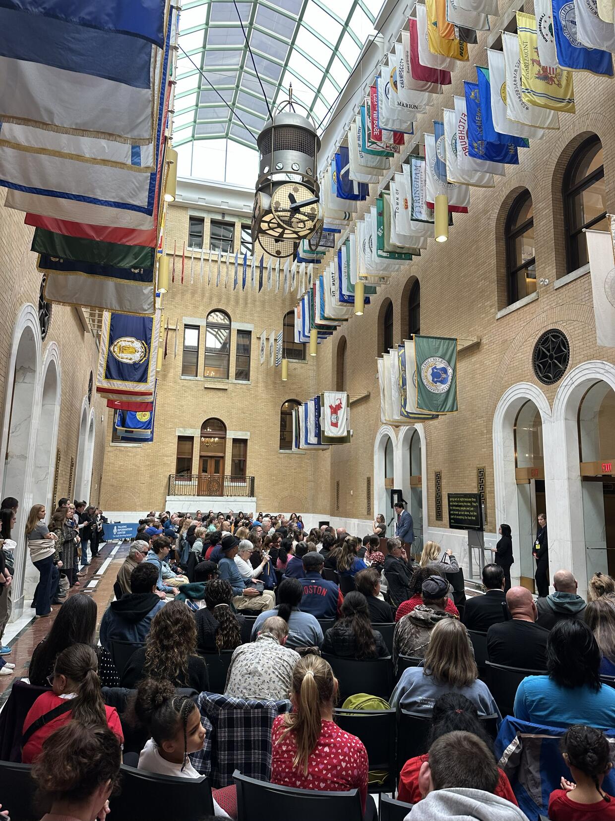 Attendees listen to the various speakers during the event