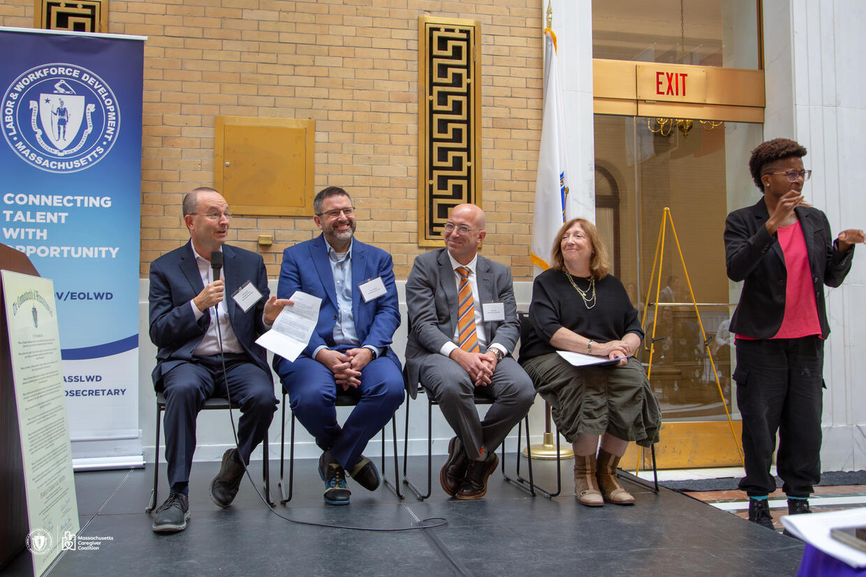 After the presentation, JD Chesloff of the Massachusetts Business Roundtable moderated a panel of experts who shared both professional insights and personal experiences as caregivers. Pictured left to right: JD Chesloff, Jared Alclair of Northeastern University, Rob Fields of Beth Israel Lahey Health, and Secretary of Aging & Independence Robin Lipson.
