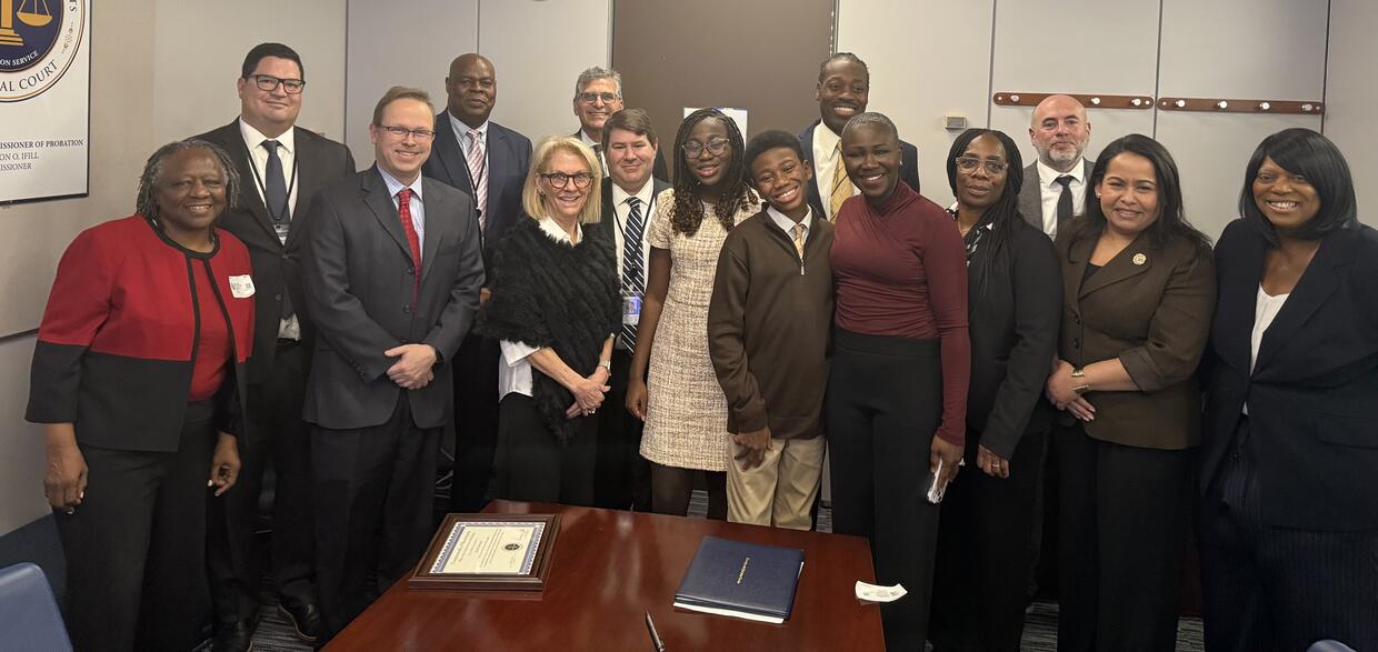 A large group of people in a conference room