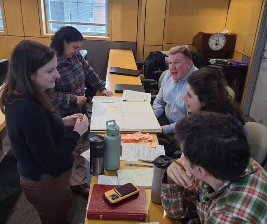 People talking around table