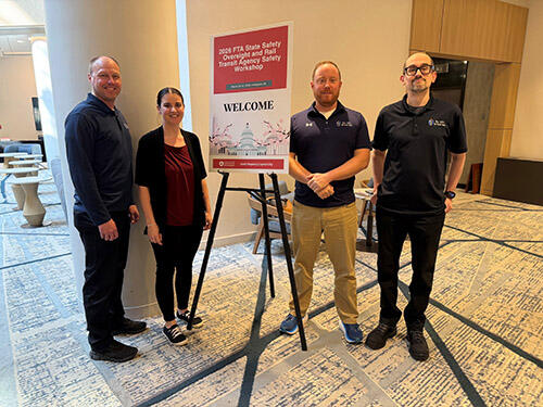 DPU Rail Transit Safety Division team members pose for a group photo at the workshop