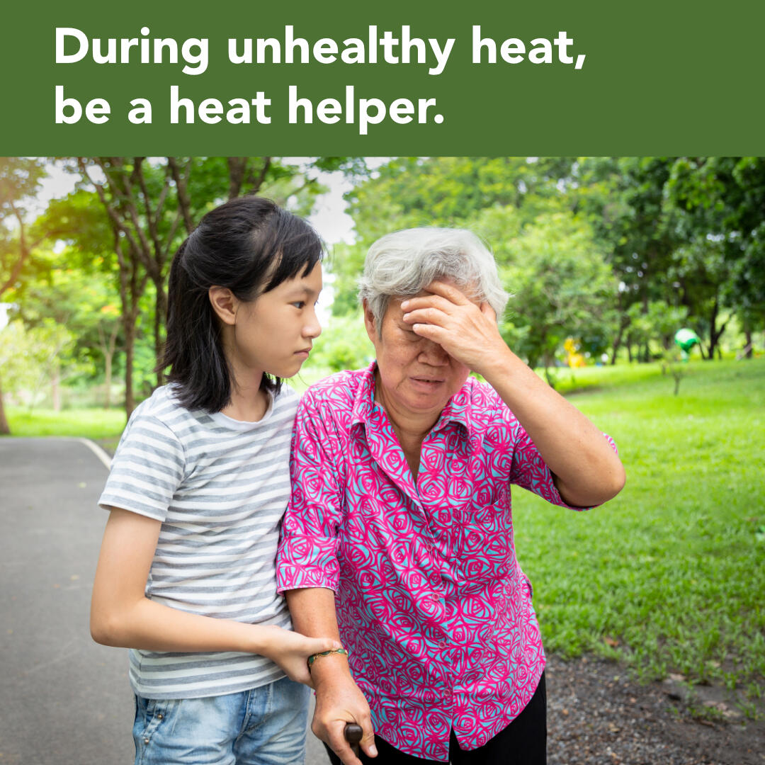 Young person helping an older adult who appears overheated while outside, with the text, "During unhealthy heat, be a heat helper."