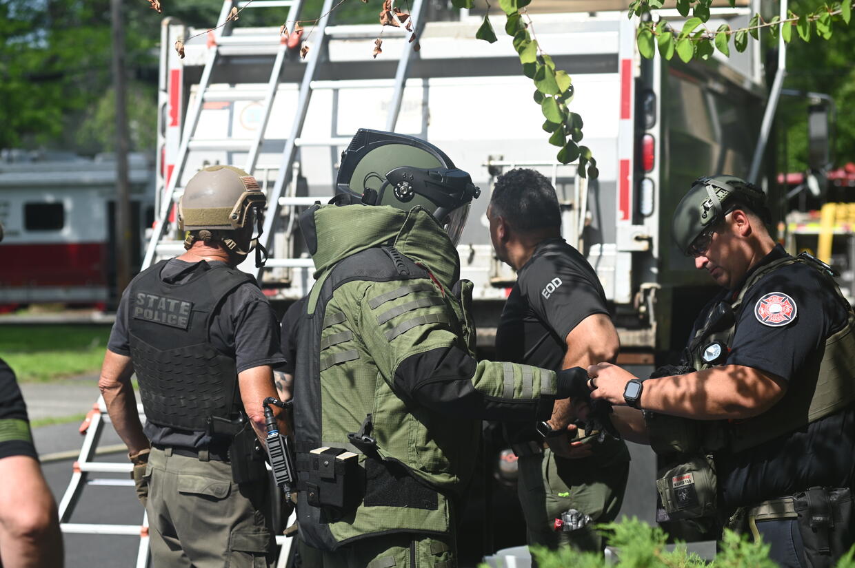 Bomb technician in a heavy bomb suit