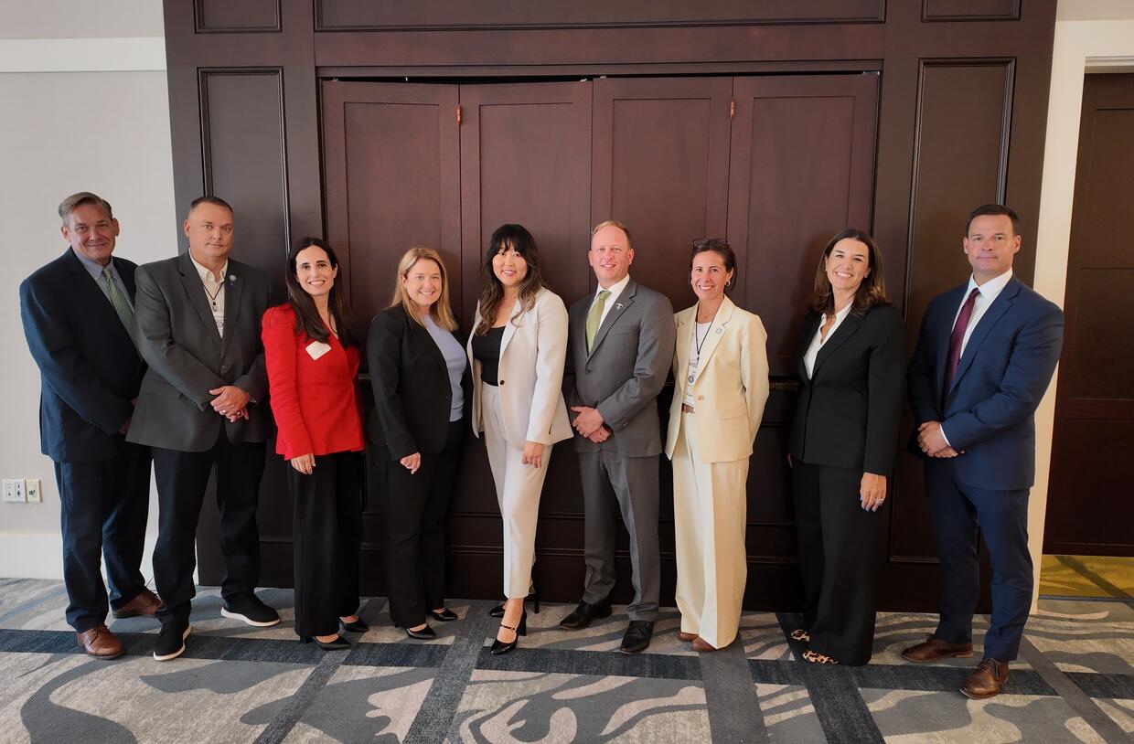 State officials pose for a photo at the 2026 Civil Rights Symposium