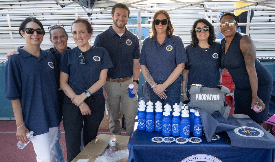 A group of probation officers pose together