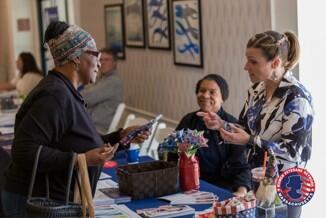 Charly Roque, Annuity Supervisor, speaking with attendees of the 2026 Women Veterans Network Conference.