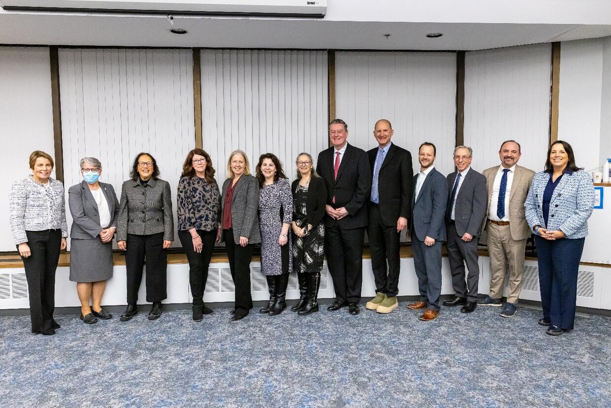 Members of the Special Commission on Senior Housing stand together for a group photo