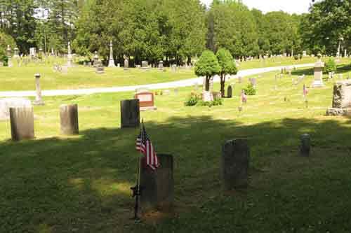 The same perspective looking north towards the Cemetery Building which is hidden behind the Arbor Vitae. The Building was constructed, replacing the existing building visible in the 1938 photograph.