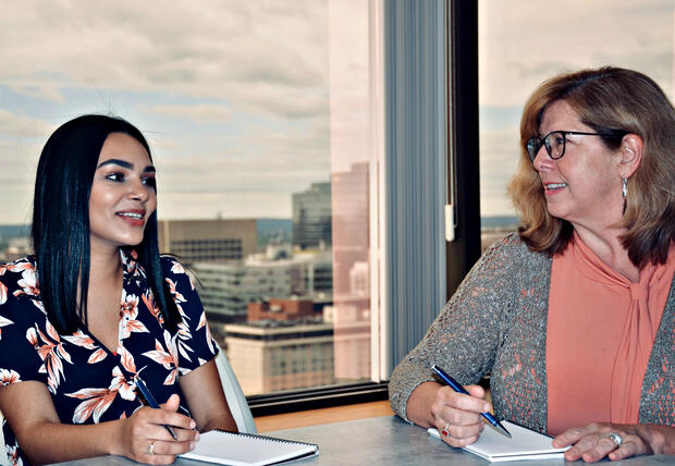 OIG employees at a meeting