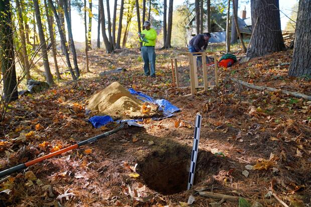 men at archaeology site