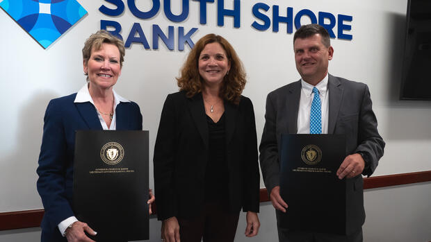 Secretary Acosta and two other people at the Banking apprenticeship event