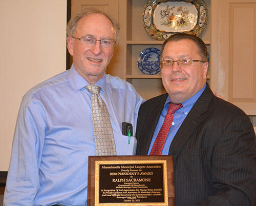 A photo of Ralph Sacramone receiving an award