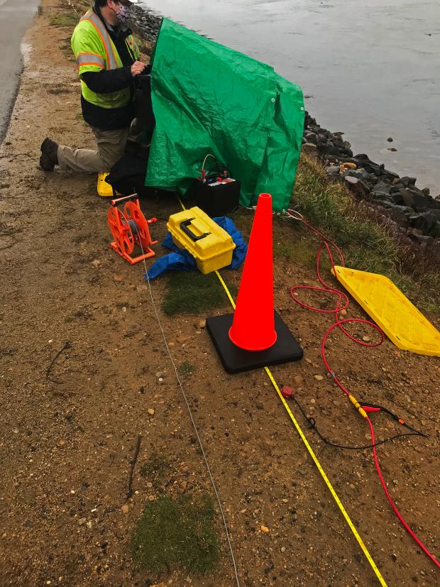 Man conducting geophysical investigations 