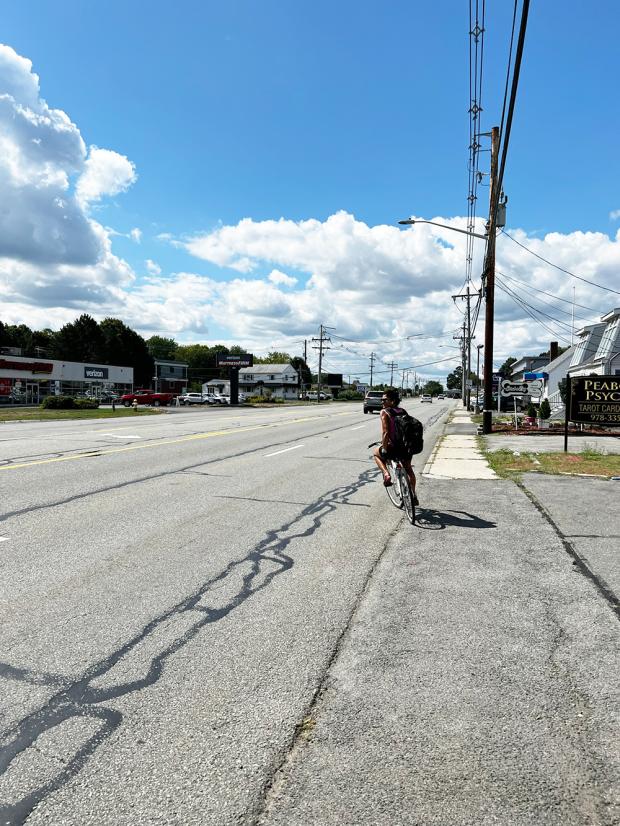 .A bicyclist crosses five lanes of travel at an uncontrolled location.