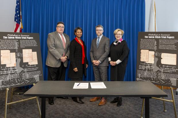 Essex County Clerk-Magistrate Thomas H. Driscoll, Jr., Supreme Judicial Court Chief Justice Kimberly S. Budd, Dan Lipcan, PEM’s Ann C. Pingree Director of the Phillips Library and Lynda Roscoe Hartigan, PEM’s Rose-Marie and Eijk van Otterloo Executive Director and CEO, gather at the Massachusetts State Archives. Image courtesy of PEM / Photo by Kathy Tarantola.