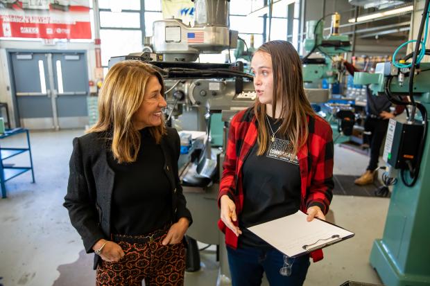 Lieutenant Governor Polito with a child in a STEM school program
