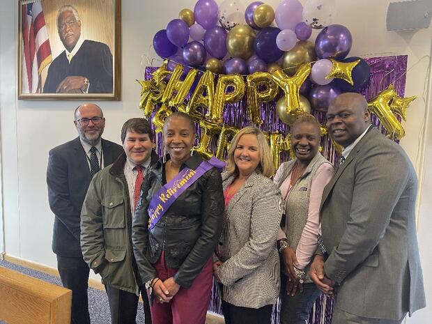 Pictured, from left: Deputy Commissioner-Programs Michael Coelho, Deputy Commissioner-Field Services Brian Mirasolo, retired Regional Supervisor Renee Payne, Boston Municipal Court-Roxbury Chief Probation Officer Susan Conrad, Probation Officer Edith Alexander, and Deputy Commissioner-Pretrial Services Pamerson Ifill.