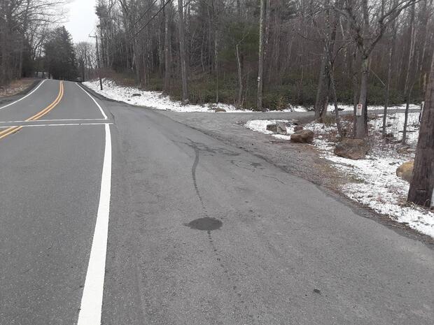 enlarged shoulder along main road where parking is possible