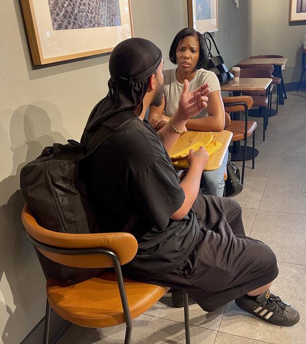 Ellen Winfrey (right) sits and talks with one of her probationers (left)