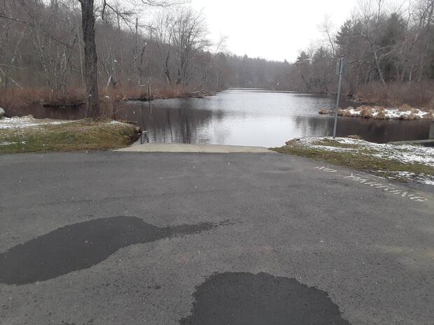 concrete boat ramp leading to waters edge