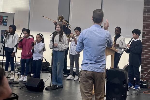 A group comprised of local children, enrolled in grades 3-11, performed before the standing room only audience.