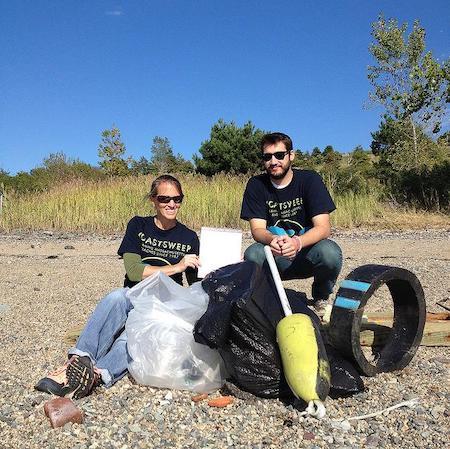 volunteers recording data on marine debris