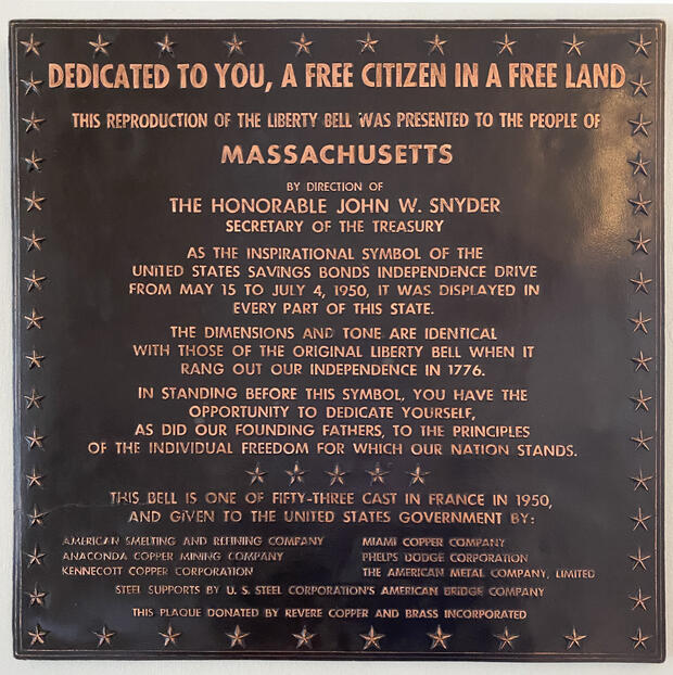 A plaque dedicating the Liberty Bell replica to the people of Massachusetts