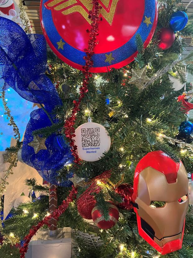 Close up of Christmas tree with Avengers-themed decorations