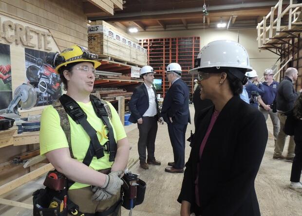 Secretary Jones meets a female carpenter apprentice