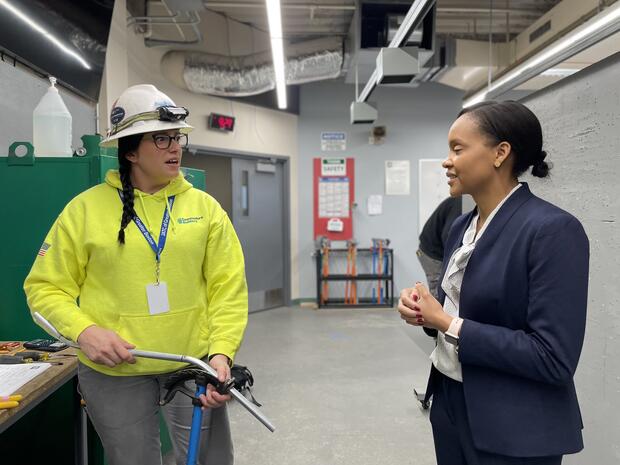 Secretary Jones meets a female electrician apprentice