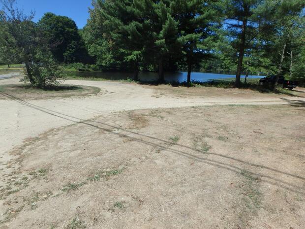 gravel circular road with parking alongside