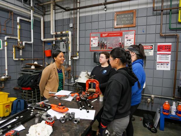 Secretary Jones meets a group pf female apprentices.