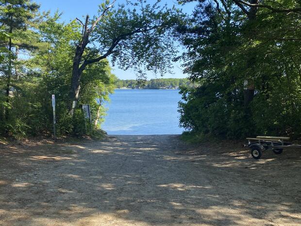 sand launch at break in trees large enough for small trailered craft