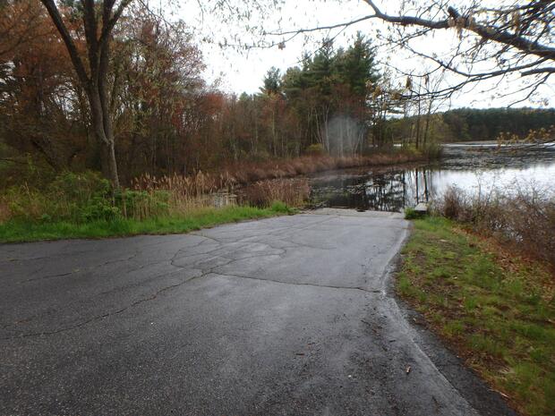 paved boat ramp terminating at waters edge