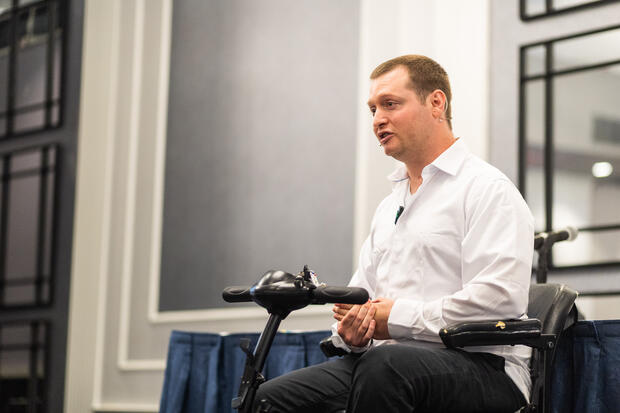 A photo of AHOI founder, Jake Haendel, speaking at the 2023 Explore Possibility Summit