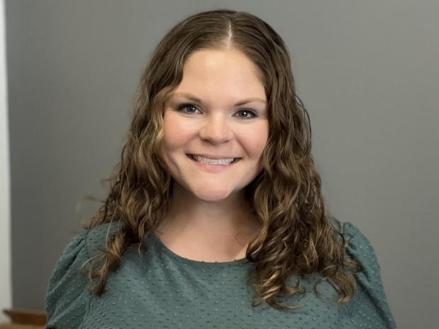 A headshot of Courtney Bacon