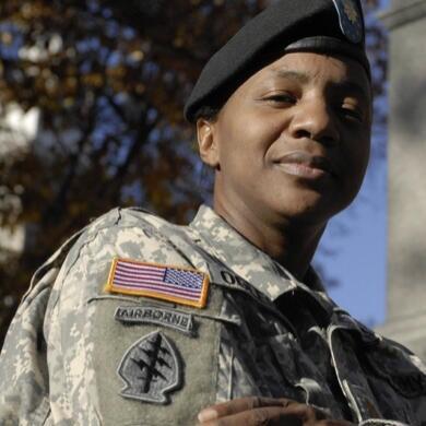 A woman dressed in U.S. Army fatigues. 