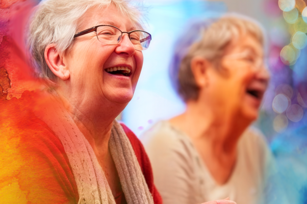 Two women laughing together