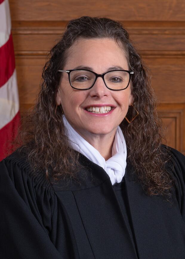 Photograph of Chief Justice Amy Lyn Blake wearing judicial robe in courtroom. 