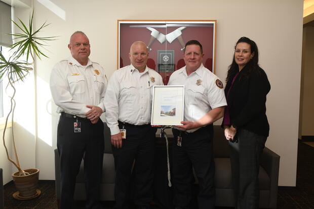 DFS code compliance officers with an award