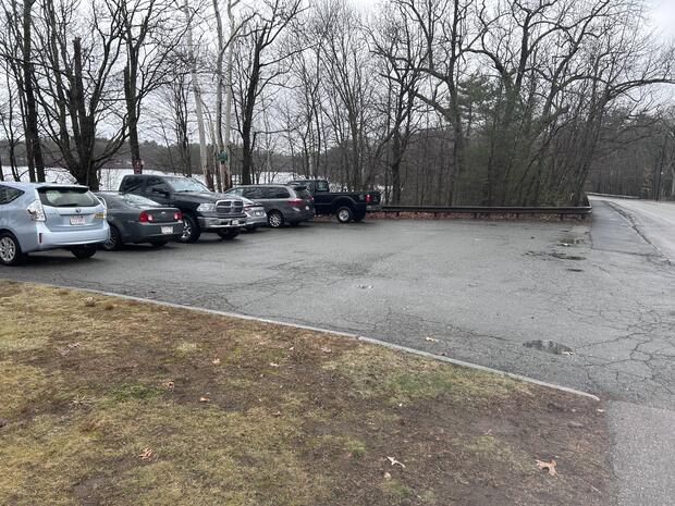 small asphalt parking are suitable for 6 cars for the cartop access into dug pond