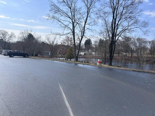 parking in an enlarged shoulder of the road in front of Lamson park