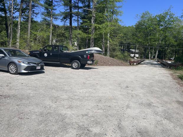 gravel parking area near the dam at adams pond
