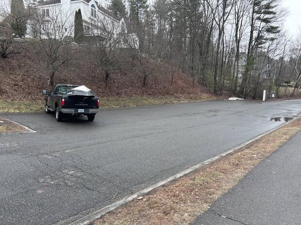 parking at an enlarged shoulder of Orchid Ln.