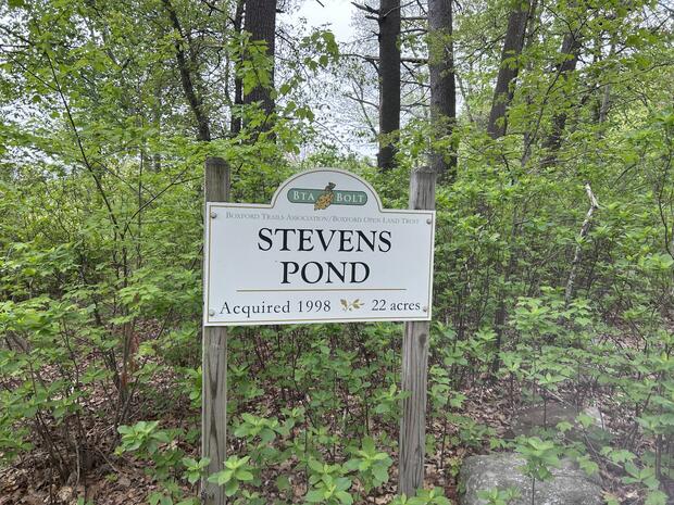sign indicating the conservation area at Stevens Pond