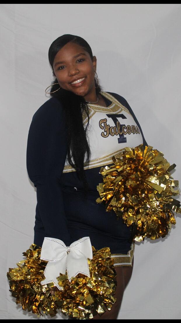 Taylor Jessica Wilkinson in her cheerleading uniform